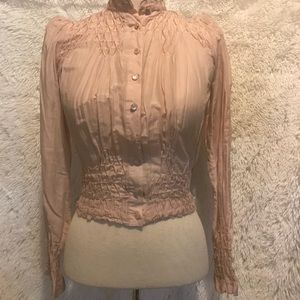 Smocked lightweight pink cotton and silk blouse
